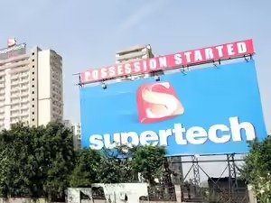 ‘Delhi Court directs FIR against Supertech’, symbolic cityscape of Noida Sector‑118 with unfinished towers, justice scales glowing above, Indian zodiac wheel subtly framing the scene.”